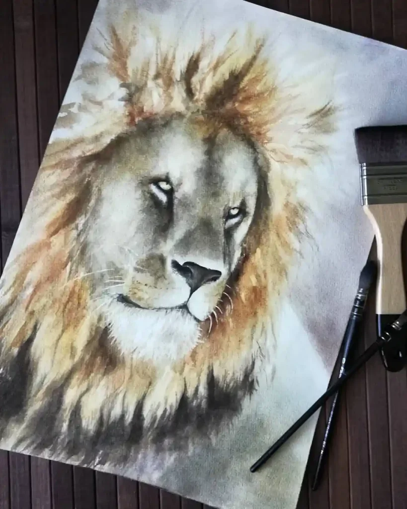 Watercolor lion with golden mane bursting against grey face tones