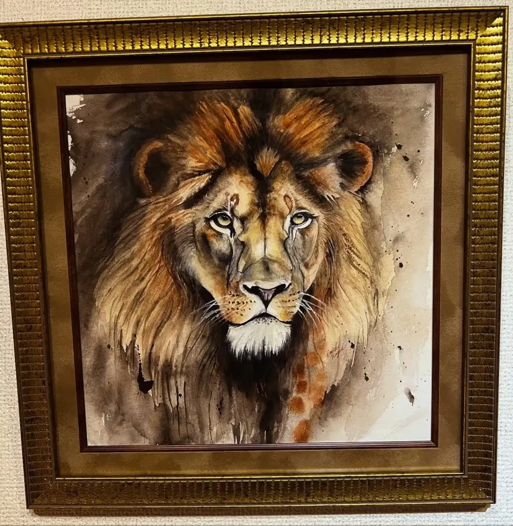 Watercolor lion with intense eyes and spontaneous background washes